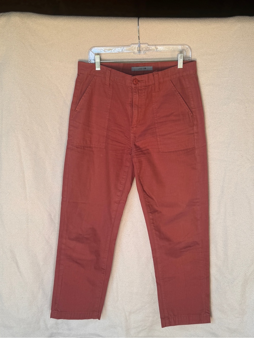Joe's Jeans high-rise straight cropped utility pants in a brick red color